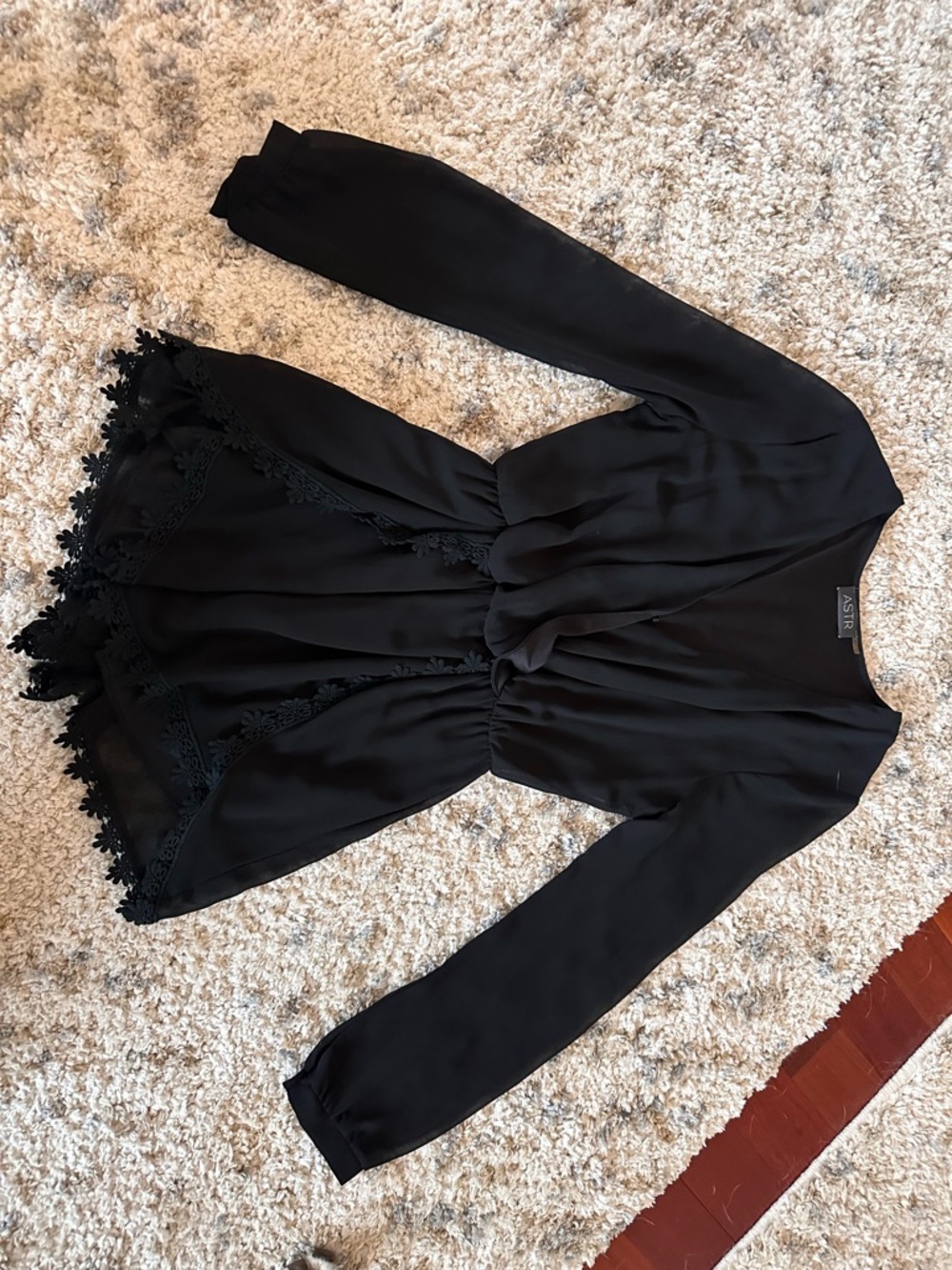 ASTR Black Long-Sleeve Peplum Romper with Lace Hem